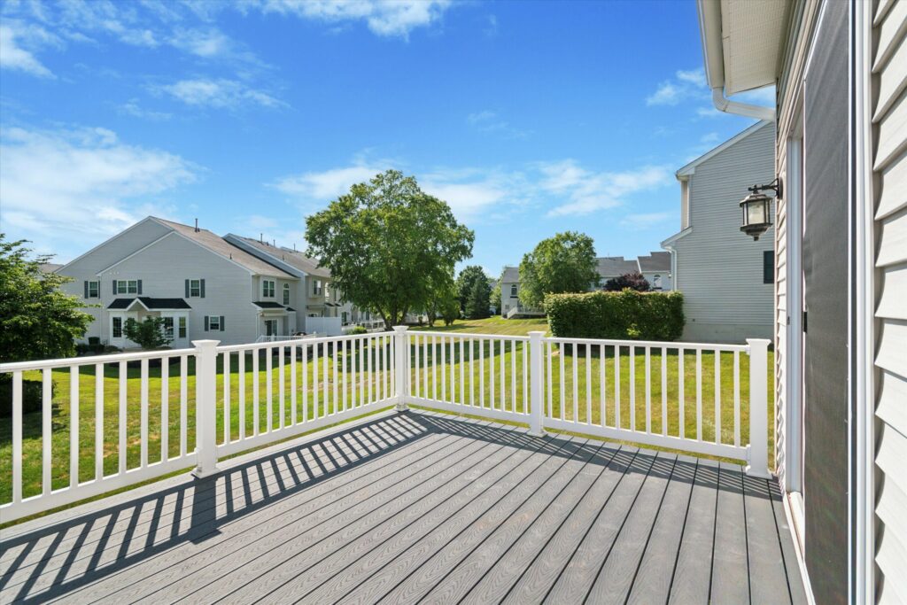 patio of a house with green grass around